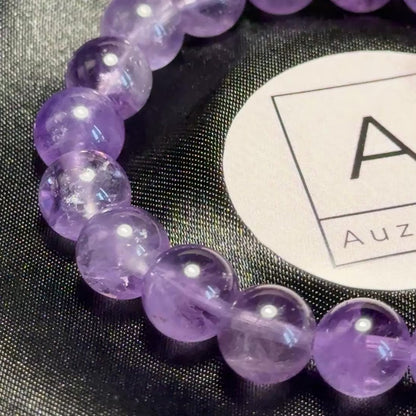 Wealth: High Grade Amethyst Crystal Bracelet 8MM (Different Length)